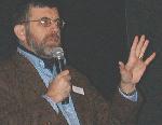 Photo of Christian Huitema giving a Talk